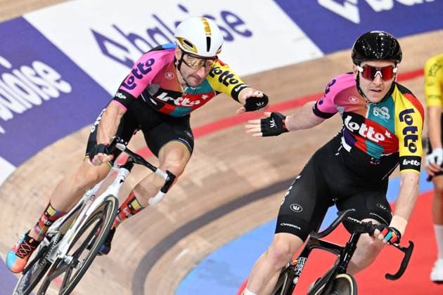 Italian Elia Viviani and Belgian Jasper De Buyst pictured in action during the last day of the Zesdaagse Vlaanderen-Gent six-day indoor Track cycling, Rad, Radsport, Bahnrad, Bahn event at the indoor cycling arena t Kuipke, Sunday 23 November 2025, in Gent. MAARTENxSTRAETEMANS  x143648638x