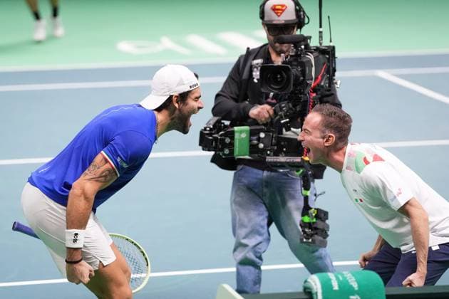 Matteo Berrettini celebrates for the victory with captain Filippo Volandri at the end of the Davis Cup Finals 2025 finals match between Matteo Berrettini (Italy) and Pablo Carreno Busta (Spain) at Bologna Fiere, Bologna, Italy - November 23, 2025. - Tennis.  Copyright: xMassimoxPaolone LaPressex