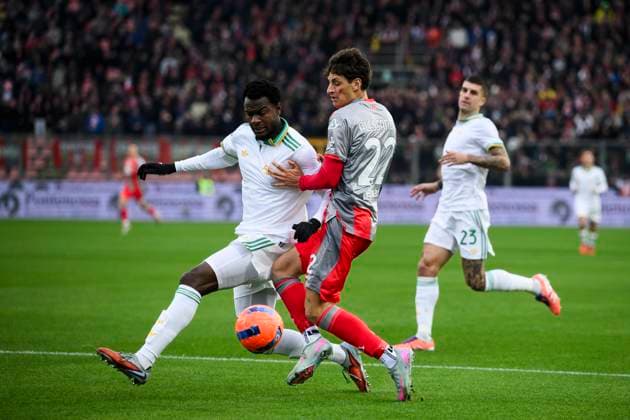 AS Roma v US Cremonese - Serie A Romano Floriani Mussolini of US Cremonese competes for the ball with Evan Ndicka of AS Roma during the Serie A football match between AS Roma and US Cremonese. Cremona Italy Copyright: xNicolòxCampox