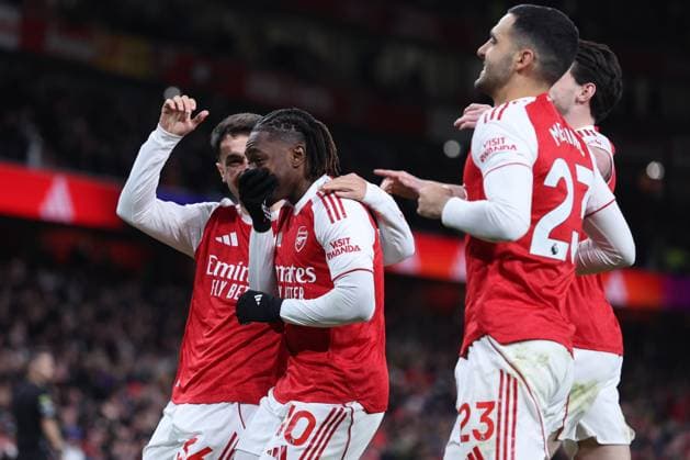 London, England, 23rd November 2025. Eberechi Eze (2nd L) of Arsenal celebrates after scoring to make it 3-0 during the Arsenal vs Tottenham Hotspur Premier League match at the Emirates Stadium, London. Picture credit should read: David Klein Sportimage EDITORIAL USE ONLY. No use with unauthorised audio, video, data, fixture lists, club league logos or live services. Online in-match use limited to 120 images, no video emulation. No use in betting, games or single club league player publications. SPI_092_DK_Arsenal_Tottenham SPI-4307-0091