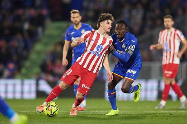 Julian Alvarez (Atletico de Madrid) and Dakonam Ortega Djene (Getafe CF) battle for the ball during the LaLiga EA Sports match between Getafe CF v AtlÃ tico Madrid at Coliseum on November 23, 2025 in Getafe, Spain. (Photo by Manu Reino DeFodi Images)