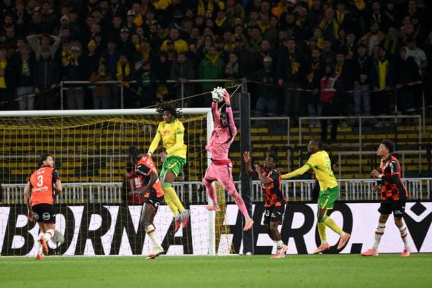 FC Nantes v FC Lorient - Ligue 1 McDonald s 2025 2026 03 Montassar TALBI (fcl) - 78 Tylel TATI (fcn) during the Ligue 1 McDonald s match between Nantes and Lorient at Stade de la Beaujoire on November 23, 2025 in Nantes, France. Nantes France  Copyright: xFEPx 776348203