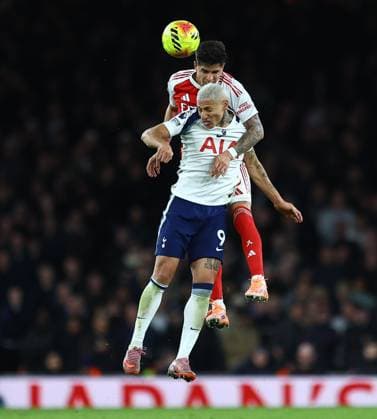 Richarlison of Tottenham Hotspur competes for the ball with Piero Hincapie of Arsenal Arsenal v Tottenham Hotspur, Premier League, Football, Emirates Stadium, London, UK - 23 Nov 2025London Emirates Stadium United Kingdom EDITORIAL USE ONLY No use with unauthorised audio, video, data, fixture lists, club league logos or live services. Online in-match use limited to 120 images, no video emulation. No use in betting, games or single club league player publications. Copyright: xMichaelxZemanek Shutterstockx 15860967az
