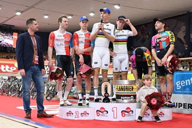 Dutch Yoeri Havik , Belgian Helene Hesters, Belgian Lindsay De Vylder, Belgian Fabio Van Den Bossche, Belgian Jasper De Buyst and Italian Elia Viviani pictured on the podium after the last day of the Zesdaagse Vlaanderen-Gent six-day indoor Track cycling, Rad, Radsport, Bahnrad, Bahn event at the indoor cycling arena t Kuipke, Sunday 23 November 2025, in Gent. MAARTENxSTRAETEMANS  x143685297x