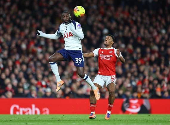 Randal Kolo Muani of Tottenham Hotspur and Jurrien Timber of Arsenal Arsenal v Tottenham Hotspur, Premier League, Football, Emirates Stadium, London, UK - 23 Nov 2025London Emirates Stadium United Kingdom EDITORIAL USE ONLY No use with unauthorised audio, video, data, fixture lists, club league logos or live services. Online in-match use limited to 120 images, no video emulation. No use in betting, games or single club league player publications. Copyright: xMichaelxZemanek Shutterstockx 15860967be