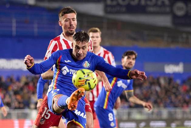 Kiko Femenia (Getafe CF) and Clement Lenglet (Atletico de Madrid) battle for the ball during the LaLiga EA Sports match between Getafe CF v AtlÃ tico Madrid at Coliseum on November 23, 2025 in Getafe, Spain. (Photo by Manu Reino DeFodi Images)