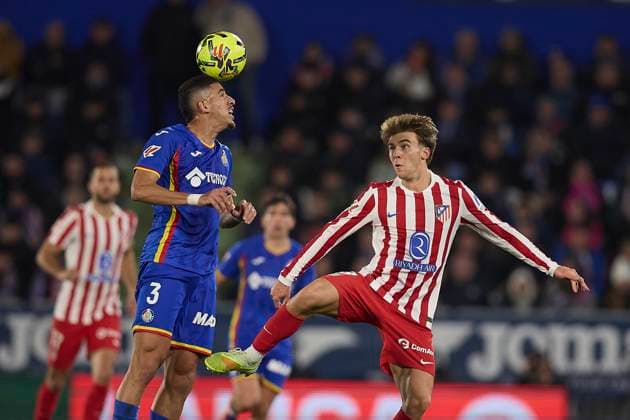 Abdel Abra (Getafe CF) and Pablo Barrios (Atletico de Madrid) battle for the ball during the LaLiga EA Sports match between Getafe CF v AtlÃ tico Madrid at Coliseum on November 23, 2025 in Getafe, Spain. (Photo by Manu Reino DeFodi Images)
