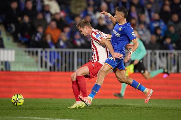Alexander Sorloth (Atletico de Madrid) and Abdel Abra (Getafe CF) battle for the ball during the LaLiga EA Sports match between Getafe CF v AtlÃ tico Madrid at Coliseum on November 23, 2025 in Getafe, Spain. (Photo by Manu Reino DeFodi Images)