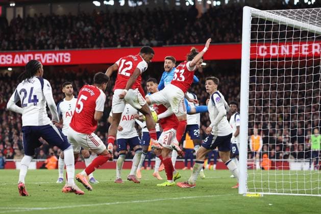 Arsenal v Tottenham 23 November 2025, London - Premier League Football - Arsenal v Tottenham Hotspur - Tottenham Hotspur goalkeeper Guglielmo Vicario is stuck behind William Saliba as Jurrien Timber of Arsenal comes close with a header - Photo: Charlotte Wilson Offside. London UK Copyright: xCharlottexWilsonx xOffsidexOffside