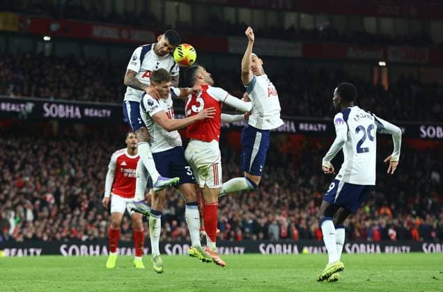 Mikel Merino of Arsenal competes for the ball with Cristian Romero of Tottenham Hotspur ,Joao Palhinha of Tottenham Hotspur and Richarlison of Tottenham Hotspur Arsenal v Tottenham Hotspur, Premier League, Football, Emirates Stadium, London, UK - 23 Nov 2025London Emirates Stadium United Kingdom EDITORIAL USE ONLY No use with unauthorised audio, video, data, fixture lists, club league logos or live services. Online in-match use limited to 120 images, no video emulation. No use in betting, games or single club league player publications. Copyright: xMichaelxZemanek Shutterstockx 15860967bq