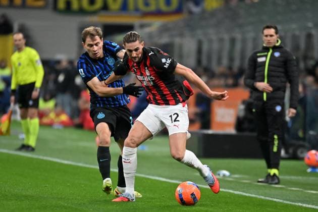CALCIO - Serie A - Inter - FC Internazionale vs AC Milan Milano Italy - November 23: Nicolo Barella and Adrien Rabiot during the Serie A match between FC Internazionale and Ac Milan at San Siro Stadium on November 23, 2025 in Milano, Italy. Milan Italy  Copyright: xIPAxSport ABACAx