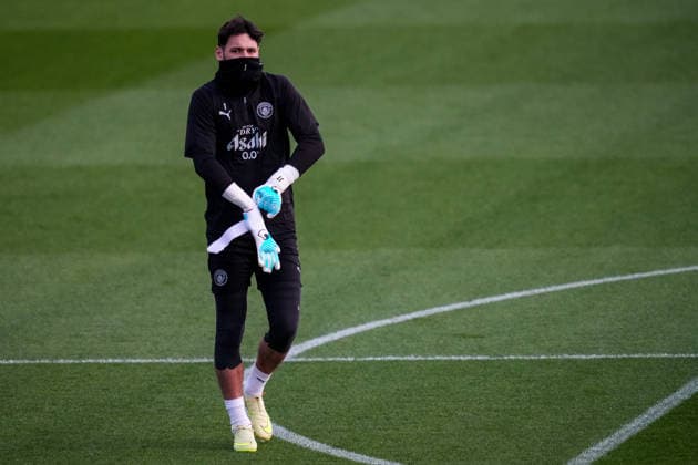 MANCHESTER, ENGLAND - NOVEMBER 24: Manchester City goalkeeper James Trafford looks on during a training session ahead of the UEFA Champions League 2025 26 League Phase MD5 match between Manchester City and Bayer 04 Leverkusen at Manchester City Football Academy on November 24, 2025 in Manchester, England. (Photo by Rene Nijhuis) SPO  Copyright: xRenexNijhuis