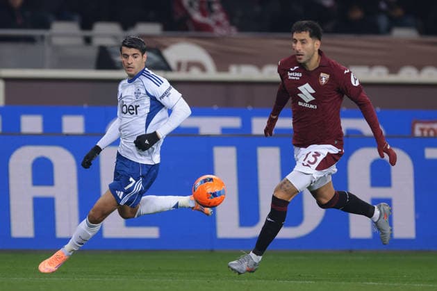 Turin, Italy, 24th November 2025. Alvaro Morata of Como 1907 and Guillermo Maripan of Torino FC during the Torino vs Como 1907 Serie A match at Stadio Grande Torino, Turin. Picture credit should read: Jonathan Moscrop Sportimage EDITORIAL USE ONLY. No use with unauthorised audio, video, data, fixture lists, club league logos or live services. Online in-match use limited to 120 images, no video emulation. No use in betting, games or single club league player publications. SPI_013_JM_TORO_COMO SPI-4297-0013