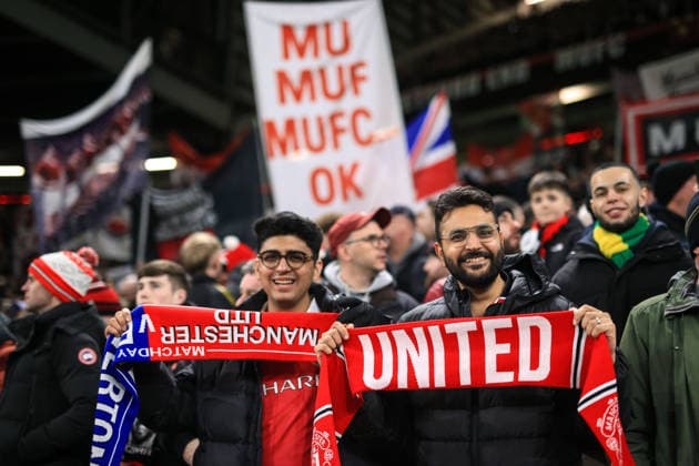 Football - Premier League - Manchester United, ManU v Everton 24th November 2025 - Premier League - Manchester United v Everton - Manchester United fans hold up scarves - Photo: Simon Stacpoole Offside. Manchester UK Copyright: xSimonxStacpoolexOffside