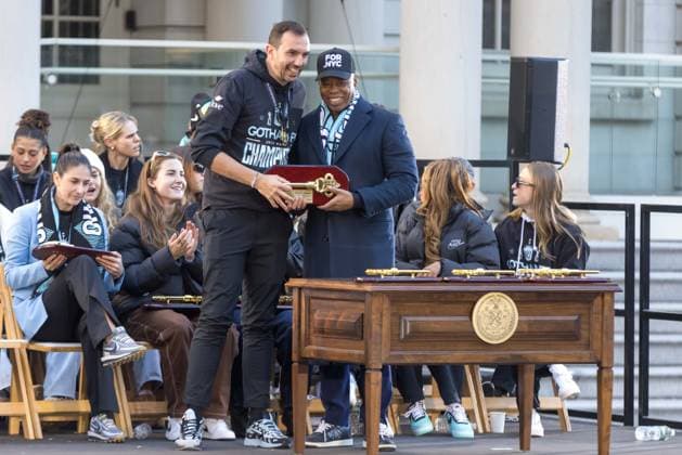 NWSL 2025 Champions Parade at City Hall Park of NJ NY Gotham FC Mayor of New York City, Eric Adams, gives the Key to the City to Juan Carlos Amoros, Head Coach of NY NJ Gotham FC, during a ceremony at City Hall after the NWSL 2025 Champions Parade at City Hall Park of NJ NY Gotham FC on November 24, 2025 in New York City. NJ NY Gotham FC defeated 1-0 to Washington Spirit on November 22nd. United States Copyright: xWilliamxVolcovx