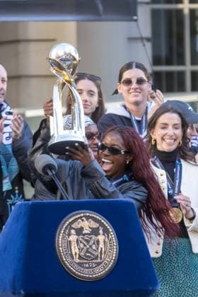 NWSL 2025 Champions Parade at City Hall Park of NJ NY Gotham FC Mandy Freeman of NJ NY Gotham FC celebrates with the trophy during a ceremony at City Hall after the NWSL 2025 Champions Parade at City Hall Park of NJ NY Gotham FC on November 24, 2025 in New York City. NJ NY Gotham FC defeated 1-0 to Washington Spirit on November 22nd. United States Copyright: xWilliamxVolcovx
