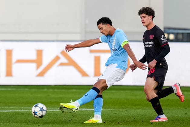 MANCHESTER, ENGLAND - NOVEMBER 25: Divine Mukasa of Manchester City U19 shoots during the UEFA Youth League 2025 26 League match between Manchester City U19 and Bayer 04 Leverkusen U19 at Joie Stadium on November 25, 2025 in Manchester, England. (Photo by Rene Nijhuis) SPO  Copyright: xRenexNijhuis
