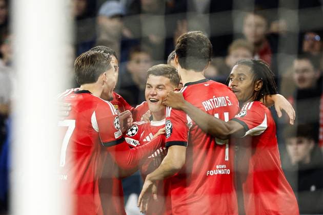AMSTERDAM - (l-r) Amar Dedic of SL Benfica, Samuel Dahl of SL Benfica, Antonio Silva of SL Benfica, and Leandro Barreiro of SL Benfica celebrate the 0-1 goal during the Champions League match between AFC Ajax and SL Benfica at the Johan Cruijff ArenA on November 25, 2025 in Amsterdam, Netherlands. ANP HOLLANDSE HOOGTE MAURICE VAN STEEN UEFA Champions League Matchday 5 2025-2026 xVIxANPxSportx xMauricexvanxSteenxIVx 543051129 originalFilename: 543051129.jpg