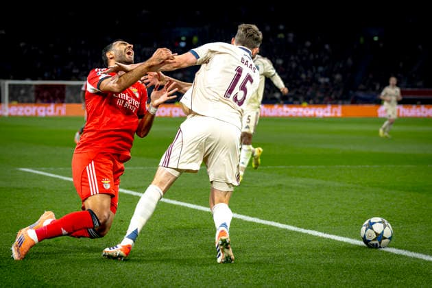 SL Benfica forwarder Vangelis Pavlidis, AFC Ajax Amsterdam defender Youri Baas during the match FOOTBALL - CHAMPIONS LEAGUE - AJAX vs BENFICA at the Johan Cruijff ArenA for the Champions League - League phase - Matchday 5 season 2025-2026 in AMSTERDAM, Netherlands on 25 November 2025, (photo by Stefan Koops EYE4images DeFodi Images)