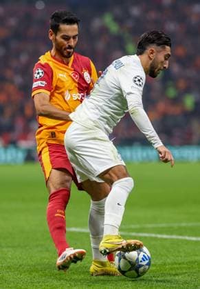 Galatasaray s Ilkay Gundogan and Union s Anouar Ait El Hadj fight for the ball during a soccer game between Turkish Galatasaray SK and Belgian Royale Union Saint-Gilloise on Tuesday 25 November 2025 in Istanbul, Turkey, on day 5 of the League phase of the UEFA Champions League tournament. VIRGINIExLEFOUR  x144206725x