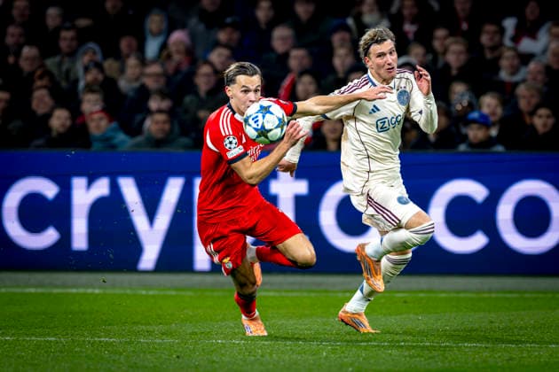 SL Benfica defender Amar Dedic, AFC Ajax Amsterdam forwarder Mika Godts during the match FOOTBALL - CHAMPIONS LEAGUE - AJAX vs BENFICA at the Johan Cruijff ArenA for the Champions League - League phase - Matchday 5 season 2025-2026 in AMSTERDAM, Netherlands on 25 November 2025, (photo by Stefan Koops EYE4images DeFodi Images)