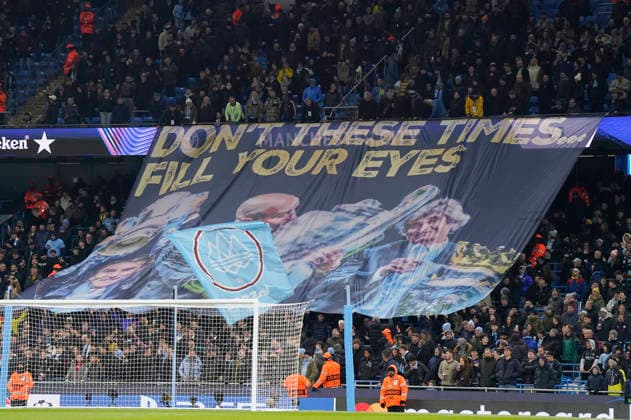 Manchester, England, 25th November 2025. Giant flag held by the fans during the Manchester City vs Bayer Leverkusen UEFA Champions League match at the Etihad Stadium, Manchester. Picture credit should read: Andrew Yates Sportimage EDITORIAL USE ONLY. No use with unauthorised audio, video, data, fixture lists, club league logos or live services. Online in-match use limited to 120 images, no video emulation. No use in betting, games or single club league player publications. SPI_018_AY_Man_City_Leverkusen SPI-4309-0029