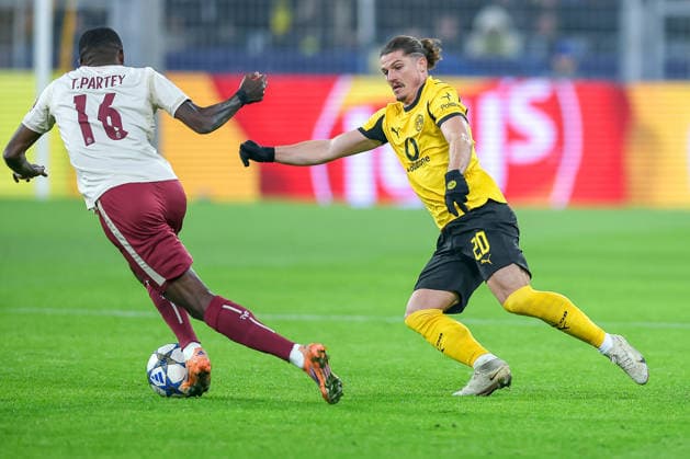 25.11.2025, Fußball, UEFA Champions League, Borussia Dortmund - FC Villarreal, BVB Stadion, 5. Spieltag, Saison 2025 2026: Thomas Partey (FC Villarreal 16) im Zweikampf gegen Marcel Sabitzer (BVB 20) Regulations prohibit any use of photographs as image sequences and or quasi-video. Nordrhein-Westfalen Deutschland