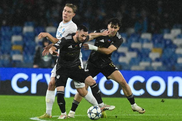Rasmus Hojlund of SSC Napoli competes for the ball with Bahlul Mustafazade of Qarabag during the Uefa Champions League match between SSC Napoli vs Qarabag at Diego Armando Maradona Stadium  Copyright: xAgostinoxGemito IPAxSportx xipa-agency.netx xx IPA_68377474 IPA_Agency_IPA68377474