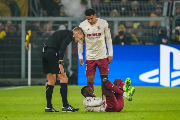 2025-11-25 Borussia Dortmund v Villarreal CF - UEFA Champions League 2025 26 League Phase MD5 DORTMUND, GERMANY - NOVEMBER 25: Nicolas Pepe of Villarreal CF lies on the ground with an injury during the UEFA Champions League 2025 26 League Phase MD5 match between Borussia Dortmund and Villarreal CF at BVB Stadion Dortmund on November 25, 2025 in Dortmund, Germany. (Photo by Gabriel Calvino Alonso BSR Agency) Dortmund Germany Content not available for redistribution in The Netherlands directly or indirectly through any third parties. Copyright: xBSRxAgencyx