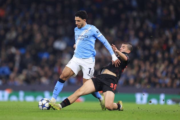 Football - UEFA Champions League - League Phase - Manchester City v Bayer Leverkusen 25th November 2025 - UEFA Champions League - League Phase - Manchester City v Bayer Leverkusen - Ibrahim Maza of Bayer Leverkusen tackles Omar Marmoush of Manchester City - Photo: Simon Stacpoole Offside. Manchester UK Copyright: xSimonxStacpoolexOffside