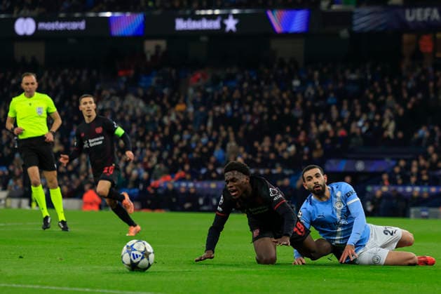Manchester City v Bayer Leverkusen Champions League 25 11 2025. Ernest Poku (19) of Bayer Leverkusen is brought down by Rayan Ait-Nouri (21) of Manchester City but no foul is given during the Champions League match between Manchester City and Bayer Leverkusen at the Etihad Stadium, Manchester, England on 25 November 2025. Manchester Etihad Stadium Manchester England Editorial use only , Copyright: xConorxMolloyx PSI-23265-0046