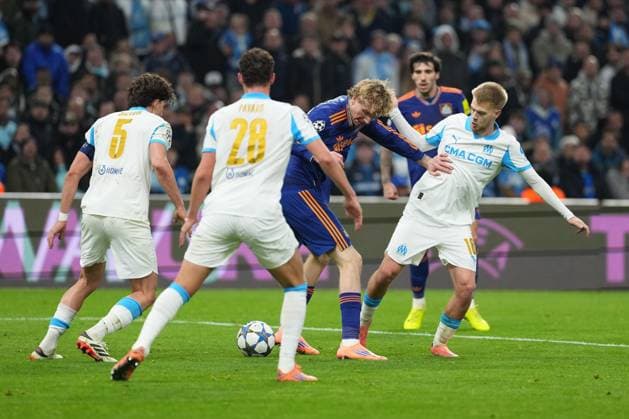 Nick Woltemade of Newcastle is crowded out Marseille v Newcastle United, UEFA Champions League, Group Stage, Football, Orange Velodrome, Marseille, France- 25 Nov 2025Marseille Orange Vélodrome France EDITORIAL USE ONLY No use with unauthorised audio, video, data, fixture lists, club league logos or live services. Online in-match use limited to 120 images, no video emulation. No use in betting, games or single club league player publications. Copyright: xDavexWinter Shutterstockx 15918266cu
