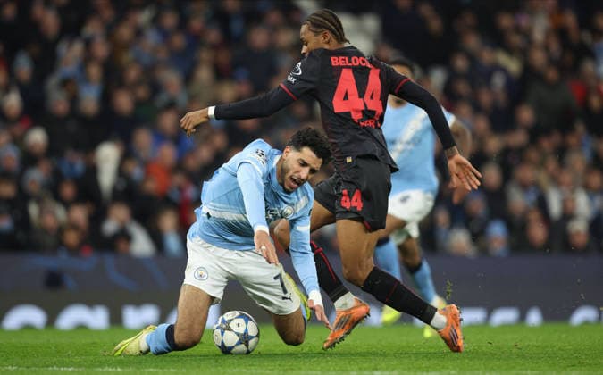 Manchester City v Bayer 04 Leverkusen - UEFA Champions League 2025 26 League Phase MD5 Omar Marmoush of Manchester City and Jeanuel Belocian of Bayer 04 Leverkusen challenge during the UEFA Champions League 2025 26 League Phase MD5 match between Manchester City and Bayer 04 Leverkusen at City of Manchester Stadium on November 25, 2025 in Manchester, England. Manchester City of Manchester Stadium England United Kingdom Copyright: xNealxSimpson Sportsphoto APLx 14142662