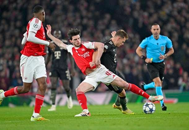 26.11.2025, Fussball UEFA Championsleague 2025 2026: Vorrunde 5.Spieltag, FC Arsenal - FC Bayern München, im Emirates-Stadion London (England) v.l. Declan Rice (FC Arsenal) gegen Joshua Kimmich (FC Bayern München)