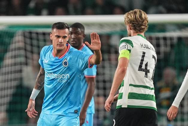 Club s Aleksandar Stankovic and Sporting s Morten Hjulmand pictured during a soccer game between Portuguese Sporting Clube de Portugal and Belgian Club Brugge KV, on Wednesday 26 November 2025 in Lisboa, Portugal, on day five of the League phase of the UEFA Champions League tournament. JOMAxGARCIAxIxGISBERT  x144490231x