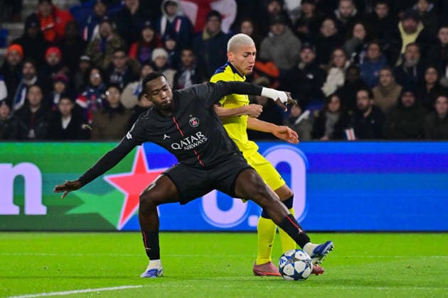 FOOTBALL : PSG vs Tottenham - Ligue des Champions - 26 11 2025 William Joel Tenorio Pacho ( 51 - PSG ) and Richarlison ( 9 - Tottenham ) during the UEFA Champions League match between Paris Saint Germain and Tottenham Hotspur FC at Parc Des Princes on November 26 , 2025 in Paris, France. ( Photo by Federico Pestellini PsnewZ ) ParisFrance  Copyright: xFedericoxPestellinix