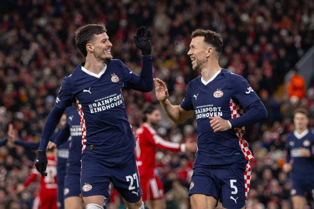 Football - UEFA Champions League - League Phase - Liverpool FC v PSV Eindhoven LIVERPOOL, ENGLAND - Wednesday, November 26, 2025: PSV Eindhoven s Ivan Perisic celebrates with team-mate Dennis Man (L) after scoring the first goal during the UEFA Champions League match between Liverpool FC and PSV Eindhoven at Anfield. (Photo by David Rawcliffe Propaganda) LIVERPOOL Anfield MERSEYSIDE ENGLAND  Copyright: xDavidxRawcliffex P2025-11-26-Liverpool_PSV-9