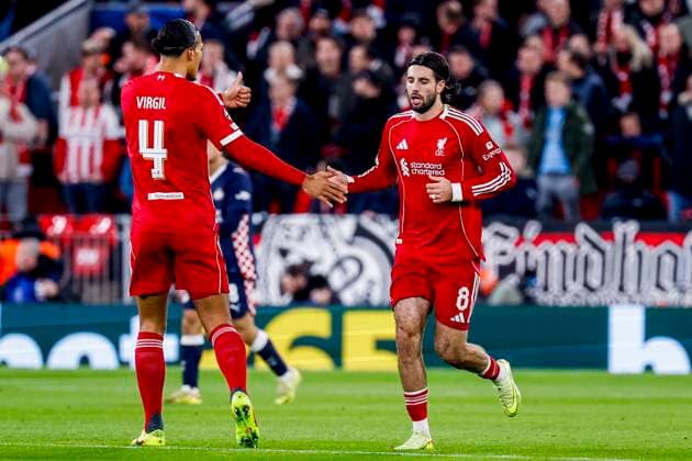 Dominik Szoboszlai of Liverpool FC celebrate their team s first goal with Virgil van Dijk of Liverpool FC Liverpool FC v PSV Eindhoven, UEFA Champions League 2025 26 League Phase MD5, Liverpool FC v PSV Eindhoven, Anfield, November 26, 2025, Liverpool, United Kingdom.