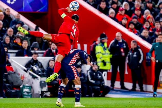 Virgil van Dijk of Liverpool FC and Ismael Saibari of PSV Eindhoven battle for the ball Liverpool FC v PSV Eindhoven, UEFA Champions League 2025 26 League Phase MD5, Liverpool FC v PSV Eindhoven, Anfield, November 26, 2025, Liverpool, United Kingdom.
