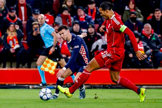Ivan Perisic of PSV Eindhoven passes the ball under pressure from Virgil van Dijk of Liverpool FC Liverpool FC v PSV Eindhoven, UEFA Champions League 2025 26 League Phase MD5, Liverpool FC v PSV Eindhoven, Anfield, November 26, 2025, Liverpool, United Kingdom.
