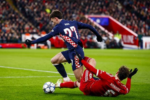 LIVERPOOL - (l-r) Dennis Man of PSV Eindhoven, Milos Kerkez of Liverpool FC during the Champions League match between Liverpool FC and PSV Eindhoven at Anfield Stadium on November 26, 2025, in Liverpool, United Kingdom. ANP SEM VAN DER WAL UEFA Champions League Matchday 5 2025-2026 xVIxANPxSportx xxANPxIVx 543155270 originalFilename: 543155270.jpg