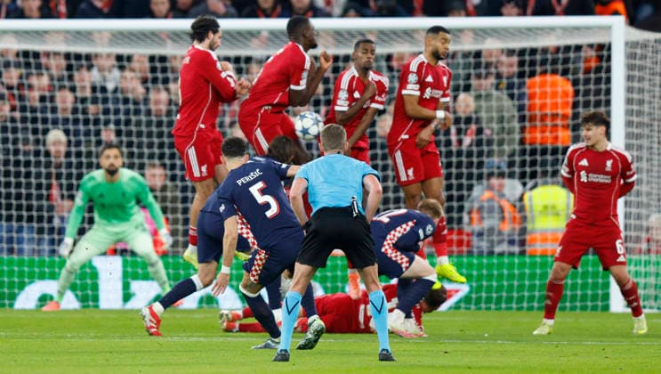 Liverpool, England, 26th November 2025. Ivan Perisic of PSV Eindhoven takes a free kick which hits the Liverpool defensive wall during the Liverpool vs PSV Eindhoven UEFA Champions League match at Anfield, Liverpool. Picture credit should read: James Baylis Sportimage EDITORIAL USE ONLY. No use with unauthorised audio, video, data, fixture lists, club league logos or live services. Online in-match use limited to 120 images, no video emulation. No use in betting, games or single club league player publications. SPI_056_JB_Liverpool_PSV SPI-4311-0056