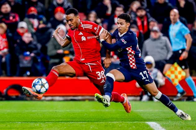 Ryan Gravenberch of Liverpool FC and Mauro Junior of PSV Eindhoven battle for the ball Liverpool FC v PSV Eindhoven, UEFA Champions League 2025 26 League Phase MD5, Liverpool FC v PSV Eindhoven, Anfield, November 26, 2025, Liverpool, United Kingdom.