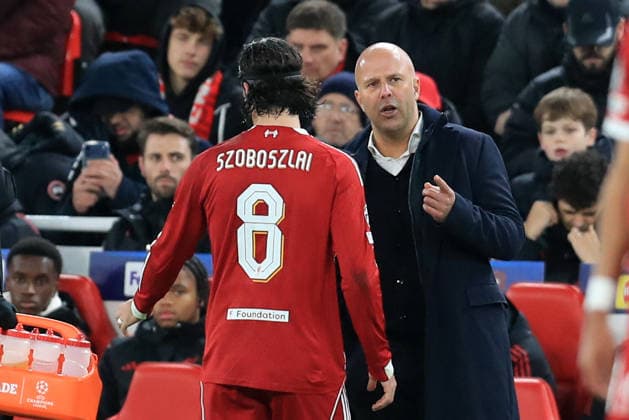 26th November 2025; Anfield, Liverpool, Merseyside, England; UEFA Champions League Football, Liverpool versus PSV Eindhoven; Liverpool manager Arne Slot speaks with Dominik Szoboszlai  DavidxBlunsden