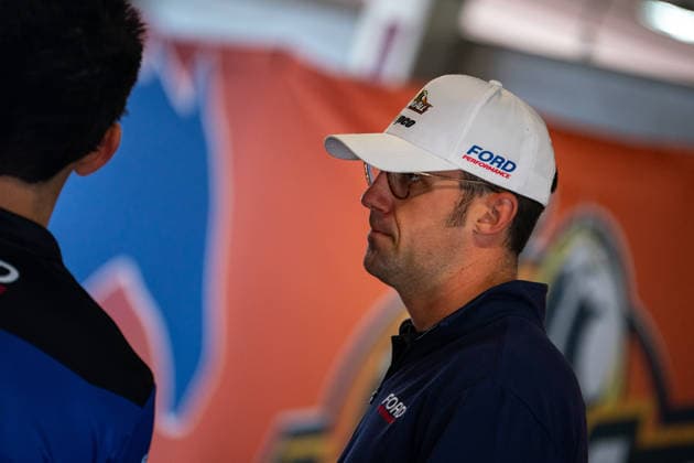 November 27, 2025, Adelaide, South Australia, Australia: NASCAR, Motorsport, USA driver AUSTIN CINDRIC for Ford Performance racing talks with his mechanics ahead of the first practice session for the Repco Supercars Championship where he is filling a wildcard slot for the weekend at the BP Ultimate Adelaide Grand Final. Adelaide Australia - ZUMAf186 20251127_zsp_f186_025 Copyright: xJamesxForresterx