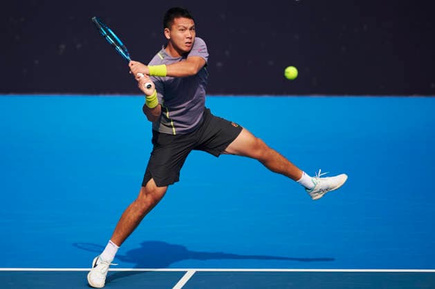 CHENGDU, CHINA - NOVEMBER 25: Yang Zijiang of China returns a shot in the Men s Singles first round match against Bu Yunchaokete of China on day 2 of 2026 Australian Open Asia-Pacific Wildcard Playoffs at the Sichuan International Tennis Centre on November 25, 2025 in Chengdu, Sichuan Province of China.  Copyright: xVCGx 111606016880