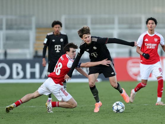 Borehamwood, England, 26th November 2025. Louie Copley of Arsenal with Magnus Dalpiaz of Bayern Munich during the Arsenal U19 vs Bayern Munich U19 UEFA Youth League match at Meadow Park, Borehamwood. Picture credit should read: David Klein Sportimage EDITORIAL USE ONLY. No use with unauthorised audio, video, data, fixture lists, club league logos or live services. Online in-match use limited to 120 images, no video emulation. No use in betting, games or single club league player publications. SPI_082_DK_Arsenal_U19_Bayern_Munich_U19 SPI-4327-0082