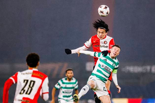 Ayase Ueda of Feyenoord Rotterdam heads the ball with Callum McGregor of Celtic FC Feyenoord Rotterdam v Celtic FC, UEFA Europa League 2025 26 League Phase MD5, Feyenoord v Celtic FC, De Kuip, November 27, 2025, Rotterdam, Netherlands.