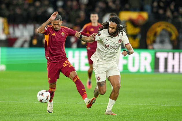 27th November 2025, Stadio Olimpico, Rome, Italy; UEFA Europa League Football; Roma versus Midtyland; Wesley of AS Roma pressured by Kevin Mbabu of FC Midtjylland  AllShotLive
