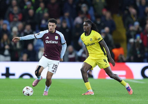 Birmingham, England, 27th November 2025. Jadon Sancho of Aston Villa tussles with Tanguy Zoukrou of Young Boys during the Aston Villa vs Young Boys UEFA Europa League match at Villa Park, Birmingham. Picture credit should read: James Baylis Sportimage EDITORIAL USE ONLY. No use with unauthorised audio, video, data, fixture lists, club league logos or live services. Online in-match use limited to 120 images, no video emulation. No use in betting, games or single club league player publications. SPI_013_JB_Villa_YoungBoys SPI-4329-0017